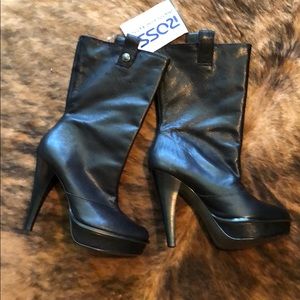 Black Calvin Klein stiletto boots